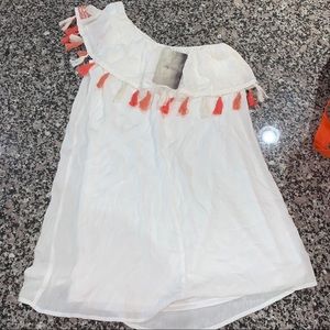 off the shoulder white top with colored tassels